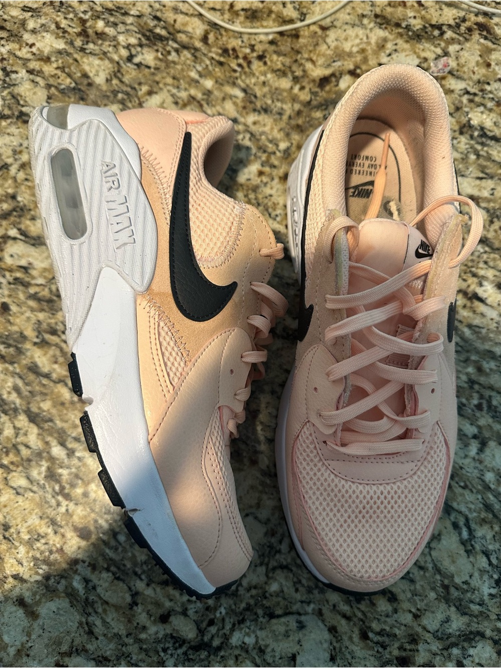 Nike Women’s Sneakers in Light Pink with Black Swoosh